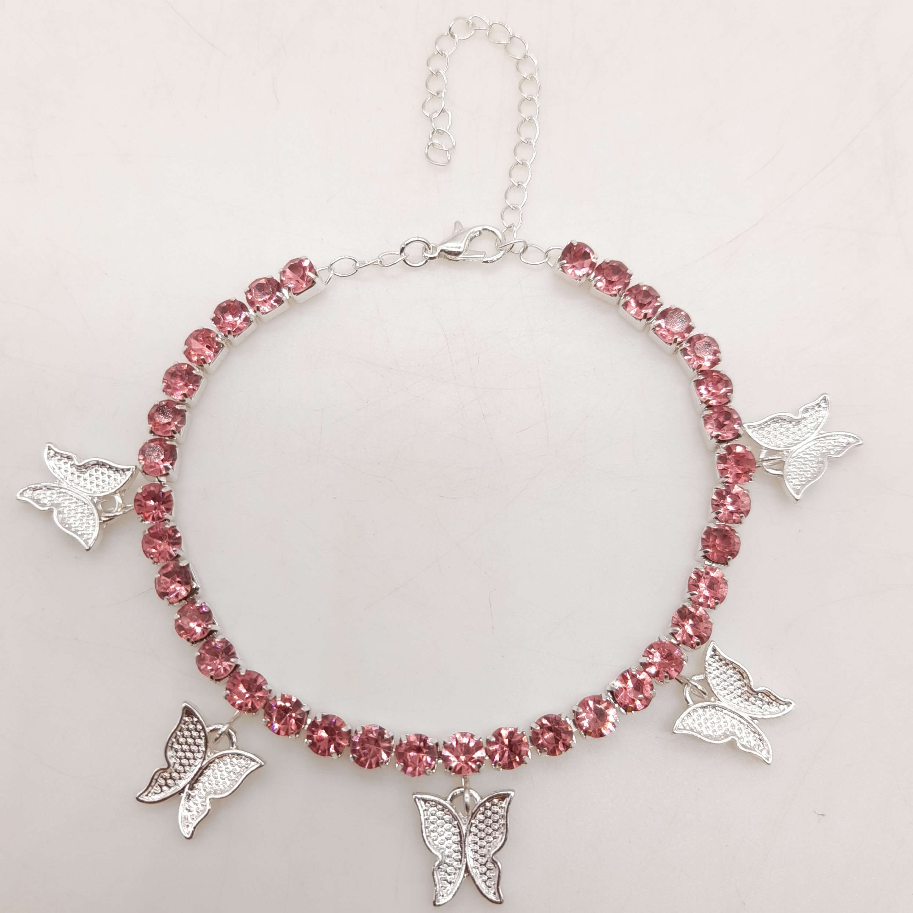 Pink butterfly online anklet